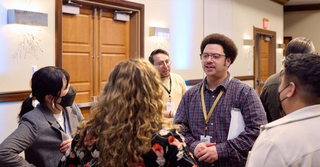 A group of individuals gather for a photo at the Inatai office Seattle. 