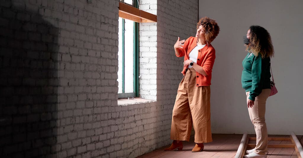 A group of individuals gather for a photo at the Inatai office Seattle. 