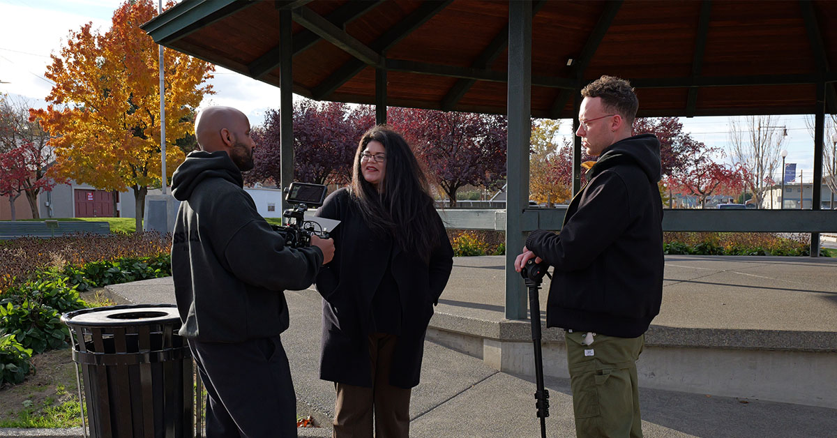 A group of individuals gather for a photo at the Inatai office Seattle. 